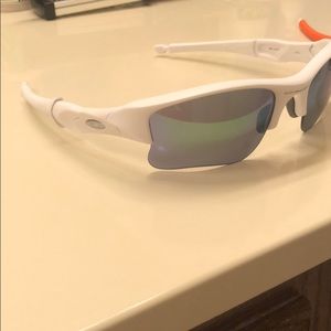 All white polarized Oakley sunglasses